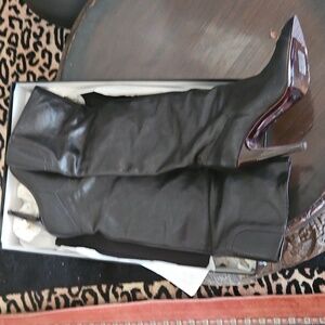 Chanel black high black leather boots